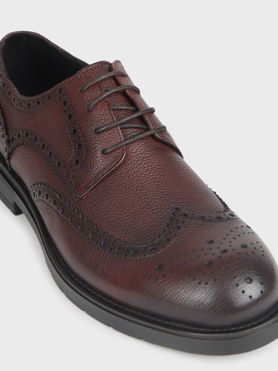 BLUCHER PICADO PIEL