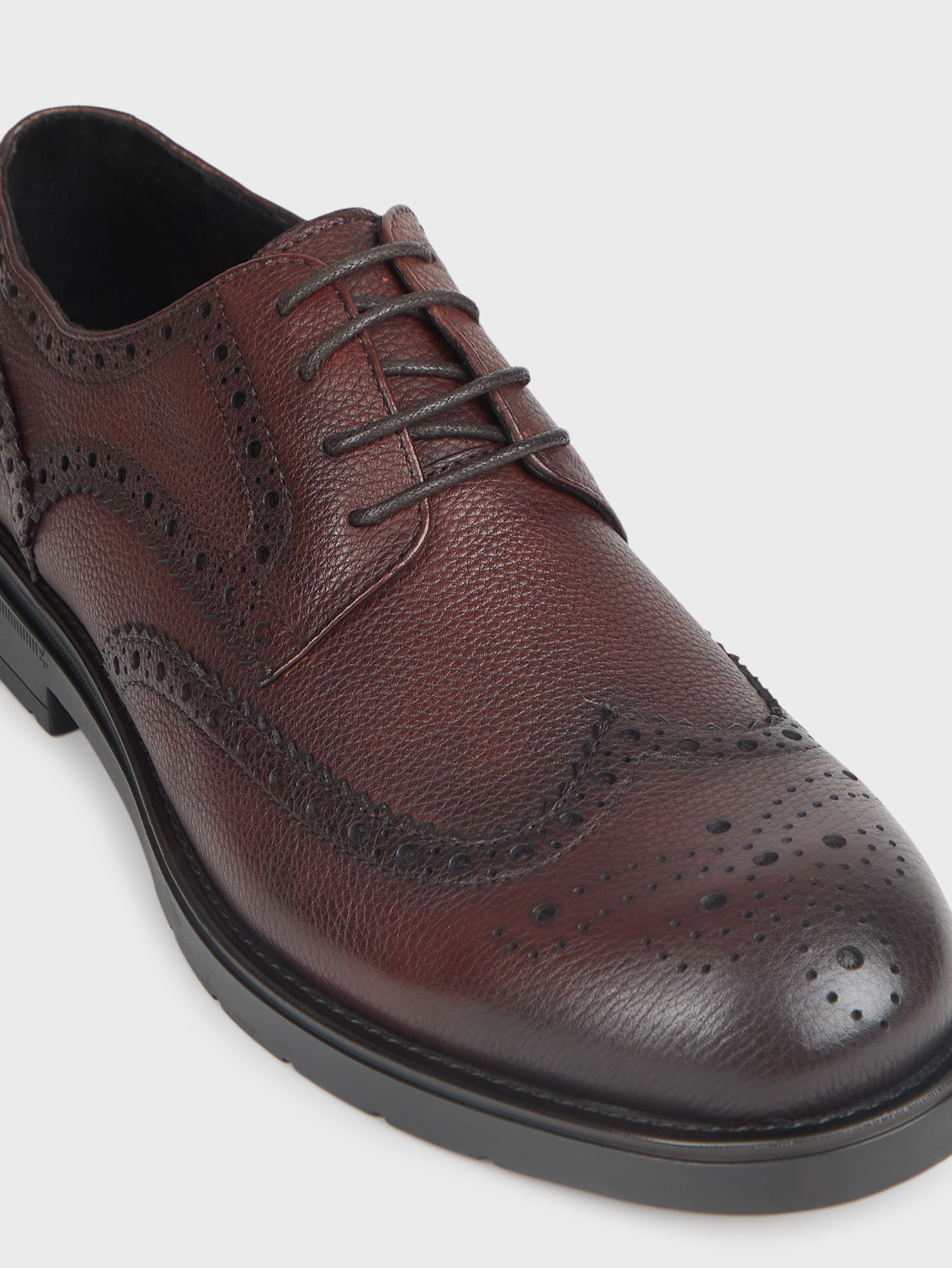 BLUCHER PICADO PIEL