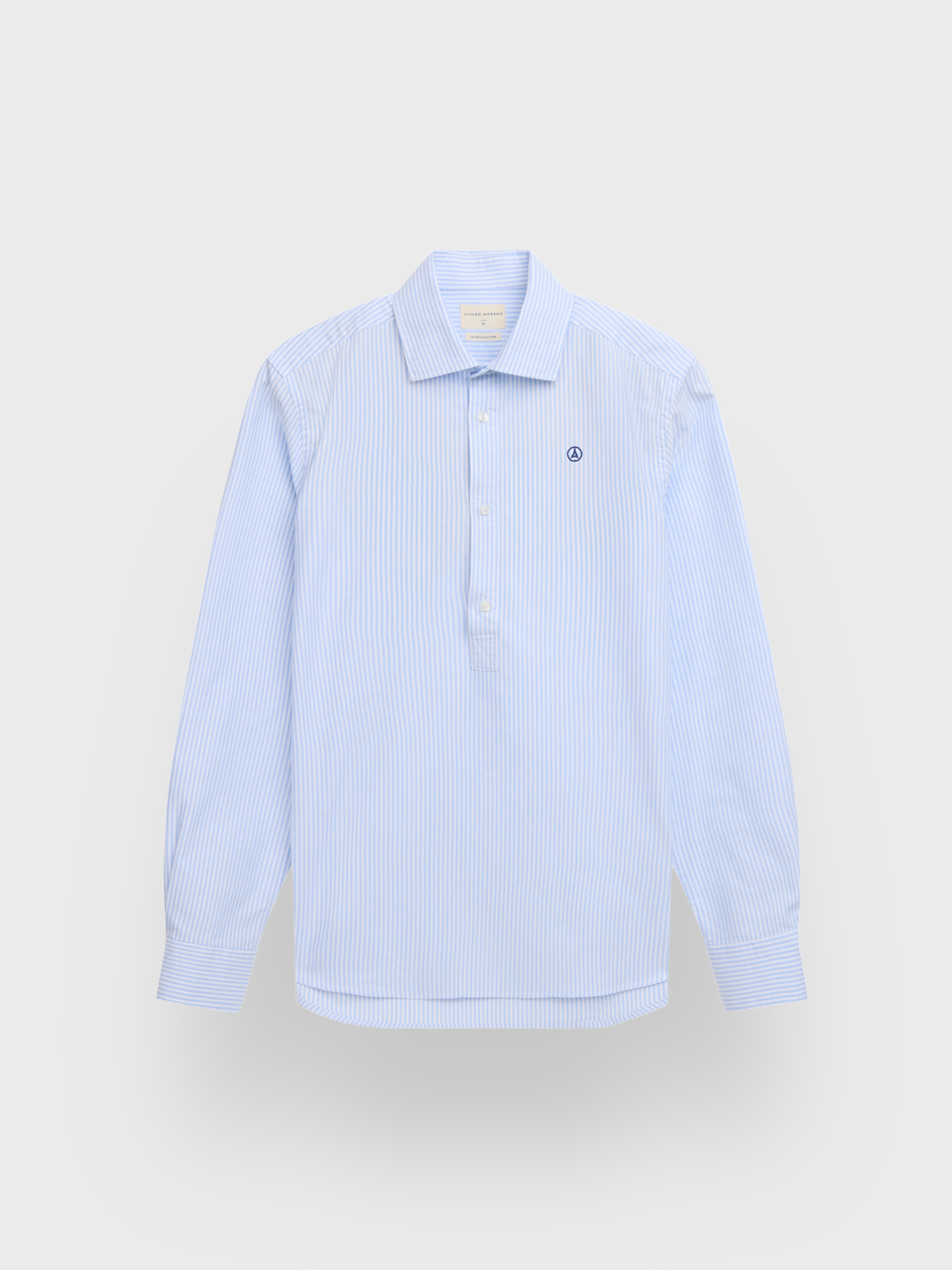 POLERA OXFORD RAYAS CELESTE
