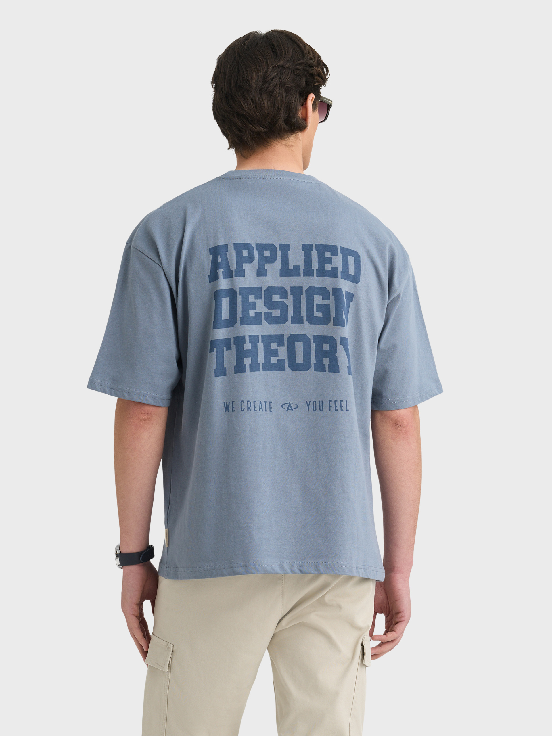 CAMISETA THEORY GRIS