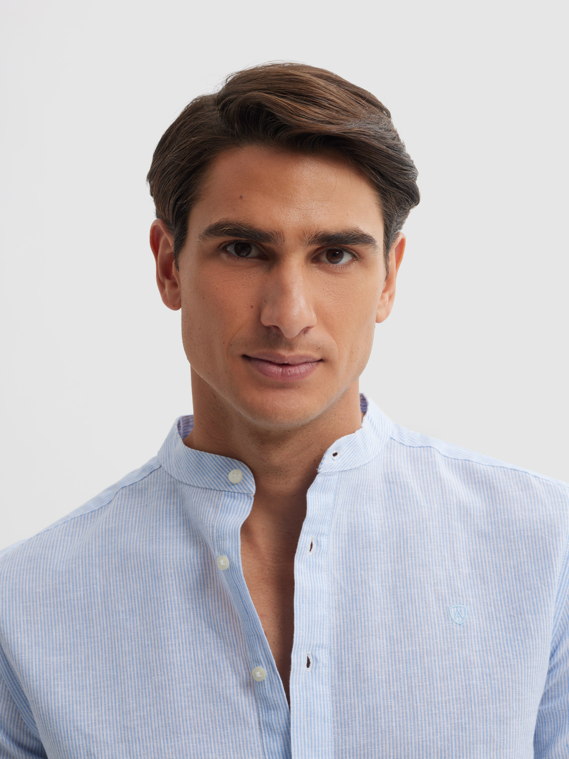 POLERA LINO RAYAS MAO CELESTE